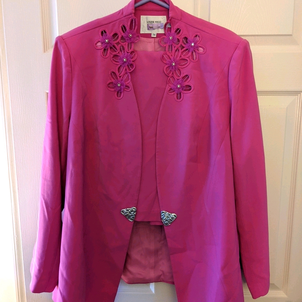 Three piece pantsuit with top, jacket and skirt
